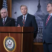 Sens. (from left) Jack Reed, D-R.I., Lindsey Graham, R-S.C., members of the Senate Armed Services Committee, and Bob Menendez, D-N.J., the ranking member of the Senate Foreign Relations Committee, are disagreeing with President Donald Trump\'s sudden decision to pull all 2,000 U.S. troops out of Syria, during a news conference at the Capitol in Washington Thursday. | AP