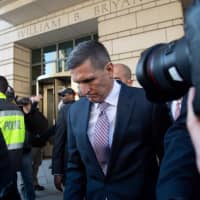 Former National Security Advisor Gen. Michael Flynn leaves after the delay in his sentencing hearing at U.S. District Court in Washington Tuesday. President Donald Trump\'s former national security chief Flynn received a postponement of his sentencing after an angry judge threatened to give him a stiff sentence. | AFP-JIJI