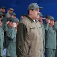 Venezuelan President Nicolas Maduro attends the end of the year ceremony with members of the Bolivarian National Armed Forces in Caracas Friday. | MIRAFLORES PALACE / HANDOUT / VIA REUTERS