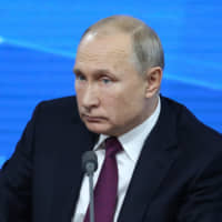 Russian President Vladimir Putin holds his annual news conference in Moscow on Thursday. | BLOOMBERG