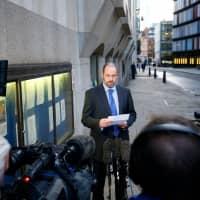 Detective chief superintendent John Boshier of Surrey police speaks after the coroner ruled that Russian businessman Alexander Perepilichnyy probably died of natural causes outside his home in 2012, after the inquest concluded at the Old Bailey in London Wednesday. | REUTERS