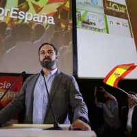 Spain\'s far-right VOX party leader Santiago Abascal pauses during a speech as he celebrates results after the Andalusian regional elections in Seville, Spain, on Sunday. | REUTERS