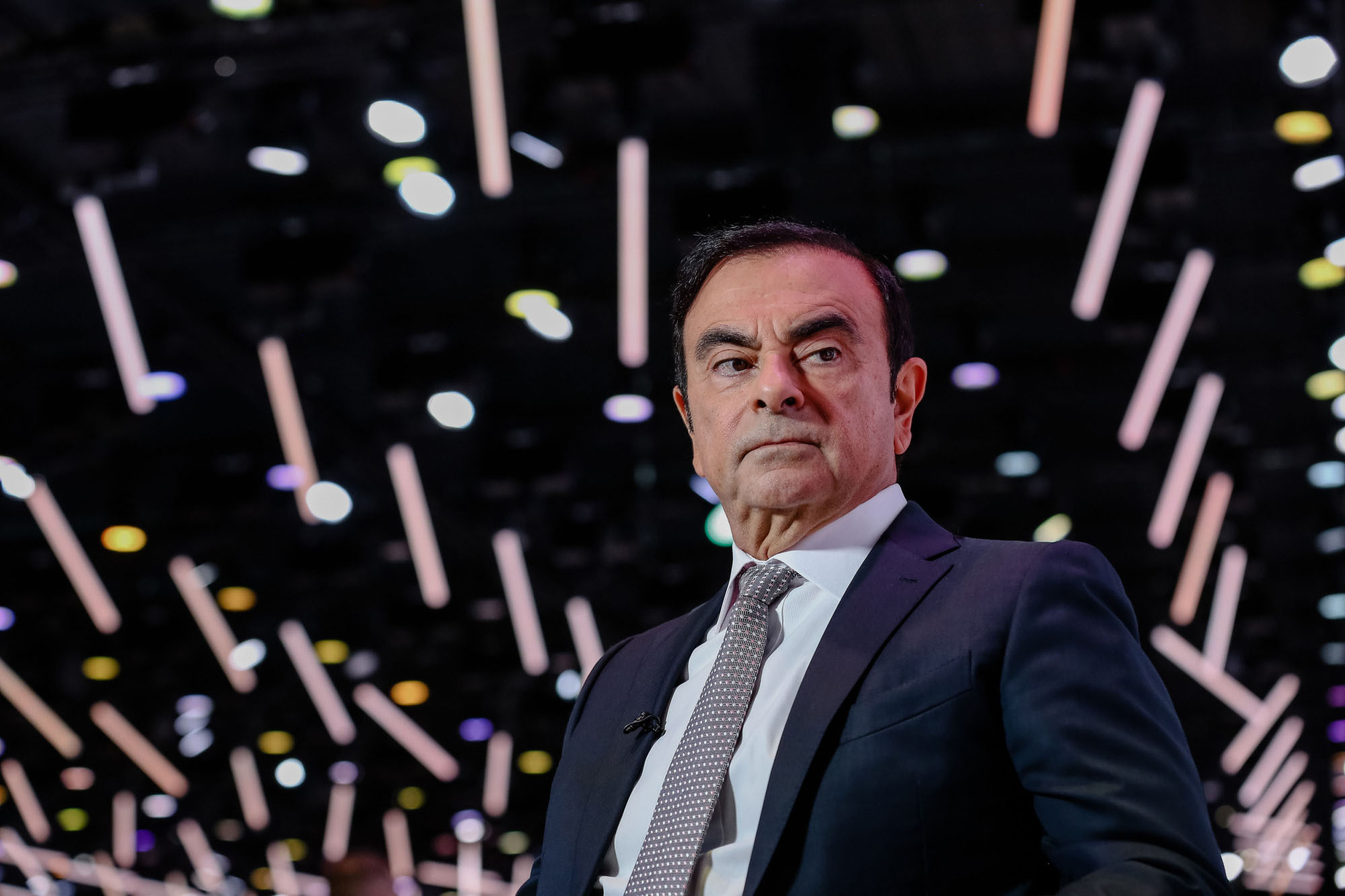 Going, going, Ghosn: Carlos Ghosn attends the Paris Motor Show in October. A month later, the Nissan Motor Co. chairman would find himself in a Tokyo jail. | BLOOMBERG