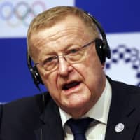 John Coates, head of the International Olympic Committee\'s inspection team, speaks during a news conference in Tokyo on Wednesday. | AP