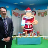 Fumio Hagiwara, a marketing executive at ice-cream-maker Akagi Nyugyo, is seen at the company\'s factory in Honjo, Saitama Prefecture, on Dec. 5. | ALEX MARTIN