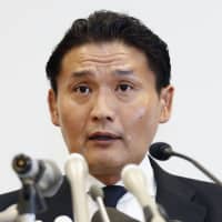 Ongoing issues in the ring: Sumo stablemaster Takanohana announces his resignation from the Japan Sumo Association at a news conference in September. | KYODO