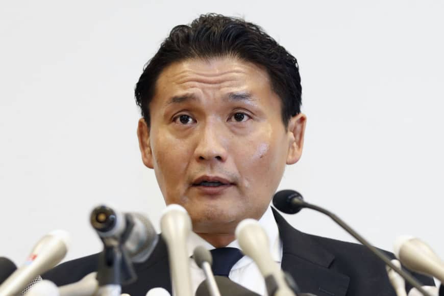 Ongoing issues in the ring: Sumo stablemaster Takanohana announces his resignation from the Japan Sumo Association at a news conference in September.