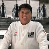 Uncompromising excellence: Chef Seiji Yamamoto in his kitchen at Nihonryori RyuGin. | ROBBIE SWINNERTON