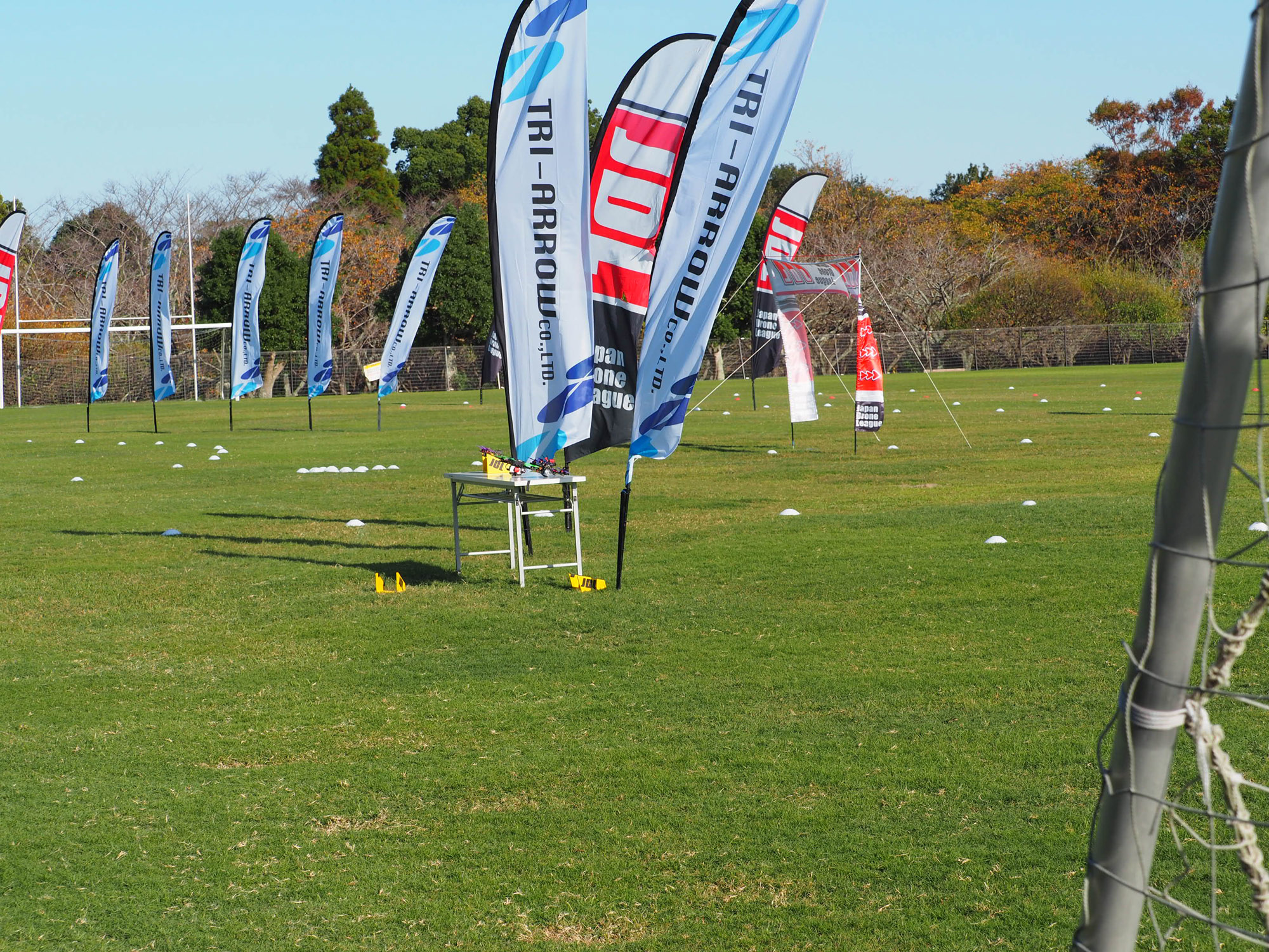 Drones prepare to race around a Japan Drone League course set up on a rugby pitch at Resol Seimei no Mori in Chiba Prefecture in October.