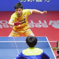 Tomokazu Harimoto (above) competes against China\'s Lin Gaoyuan on Sunday in the table tennis World Tour Grand Finals. The 15-year-old Harimoto became the tournament\'s youngest singles champion after winning the showdown in Incheon, South Korea. | KYODO