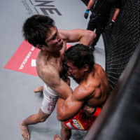 Shinya Aoki (left) fights  Eduard Folayang on Nov. 11, 2016, during a ONE Championship event. | ONE CHAMPIONSHIP