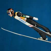 Ryoyu Kobayashi competes during the first leg of the Four Hills Tournament on Sunday in Oberstdorf, Germany. Kobayashi won to earn his fifth victory of the season. | KYODO