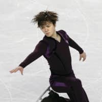 Shoma Uno competes in the short program at the Grand Prix Final in Vancouver, British Columbia, on Thursday night. Uno is second going into Friday\'s free skate. KYODO | KYODO