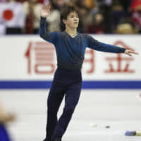 Shoma Uno acknowledges the crowd after completing his routine on the second day of the NHK Trophy in Hiroshima on Nov. 10. | KYODO