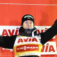 Ski jumper Ryoyu Kobayashi waves to fans after finishing third in Saturday\'s FIS World Cup event in Nizhny Tagil, Russia. | KYODO