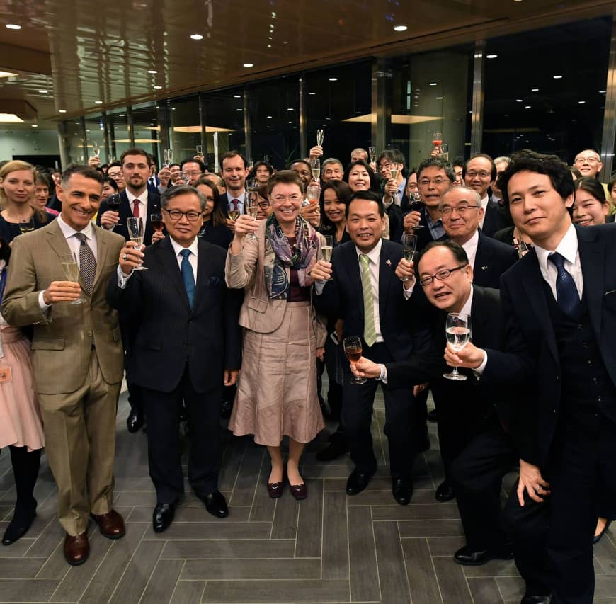 Ambassador of the European Union Patricia Flor (center) raises a glass with guests during a year-end party at the delegation of the European Union to Japan
