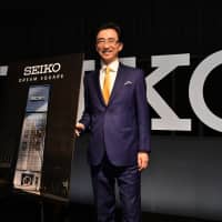 Shinji Hattori, chairman and group CEO of Seiko Holdings Corp., unveils details about Seiko Dream Square at the Imperial Hotel Tokyo on Nov. 30. The space is scheduled to open on Dec. 20 as an interactive store that boasts a museum and artisan demonstrations to showcase Seiko\'s brand identity to global customers. | YOSHIAKI MIURA