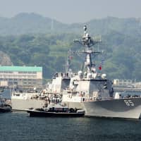The U.S. Navy warship USS McCampbell departs U.S. Fleet Activities Yokosuka in Kanagawa Prefecture last May. | U.S. NAVY
