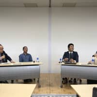 Entrepreneurs hold a discussion at a symposium co-hosted by the Japan Times Satoyama Consortium in Jinsekikogen, Hiroshima Prefecture, on Oct. 20. | MAIKO MURAOKA