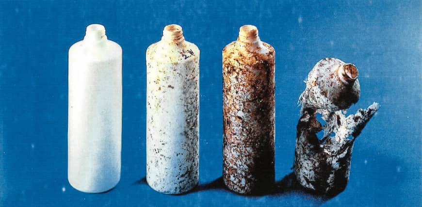 An eco-friendly, biodegradable polylactic acid, which is decomposed by microorganisms found in soil, is under development by Japanese researchers. The bottles pictured represent various stages of the plant-based plastic