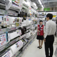 Strong sales of air conditioners to cope with last summer\'s heat wave helped push up shipments of appliances to their highest level in 22 years. | KYODO