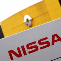 The logos of car manufacturers Renault and Nissan are seen in front of a common dealership of the companies in Saint-Avold, France, Jan. 15. | REUTERS