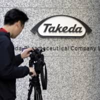Takeda Pharmaceutical Co. is expanding a push to cut debt after its takeover of Shire PLC. | BLOOMBERG