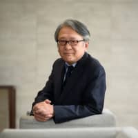 Hideo Hayakawa, senior executive fellow at Fujitsu Research Institute, poses for a photograph in Tokyo on Tuesday. The yen is likely to reach its strongest level in more than six years if Japan enters a recession, which could come as early as the fall of this year, according to the former central bank official. | BLOOMBERG