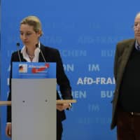 Alice Weidel and Alexander Gauland, faction leaders of the Alternative for Germany (AfD) party, brief the media in Berlin Tuesday. The German domestic intelligence agency is putting the far-right Alternative for Germany party under heightened scrutiny. | AP