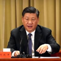 Chinese President Xi Jinping speaks during an event to commemorate the 40th anniversary of the \"Message to Compatriots in Taiwan\" at the Great Hall of the People in Beijing on Wednesday. | REUTERS