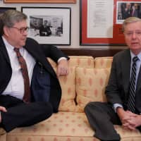 Incoming Senate Judiciary Committee Chairman Lindsey Graham (R-SC) meets with U.S. Attorney General nominee William Barr (left) in Washington Jan. 9. | REUTERS