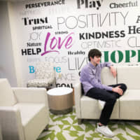 Danny Reagan, a former residential patient of the Lindner Center of Hope, sits in a common room at the center in Mason, Ohio, on Wednesday. | REUTERS