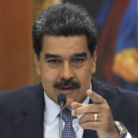 Venezuela\'s President Nicolas Maduro holds a press conference with foreign media at the Miraflores presidential palace in Caracas Wednesday. Maduro will be sworn-in for a second, six-year term on Thursday. | AP