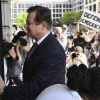 Paul Manafort arrives for a hearing at U.S. District Court on in Washington last June. | AFP-JIJI