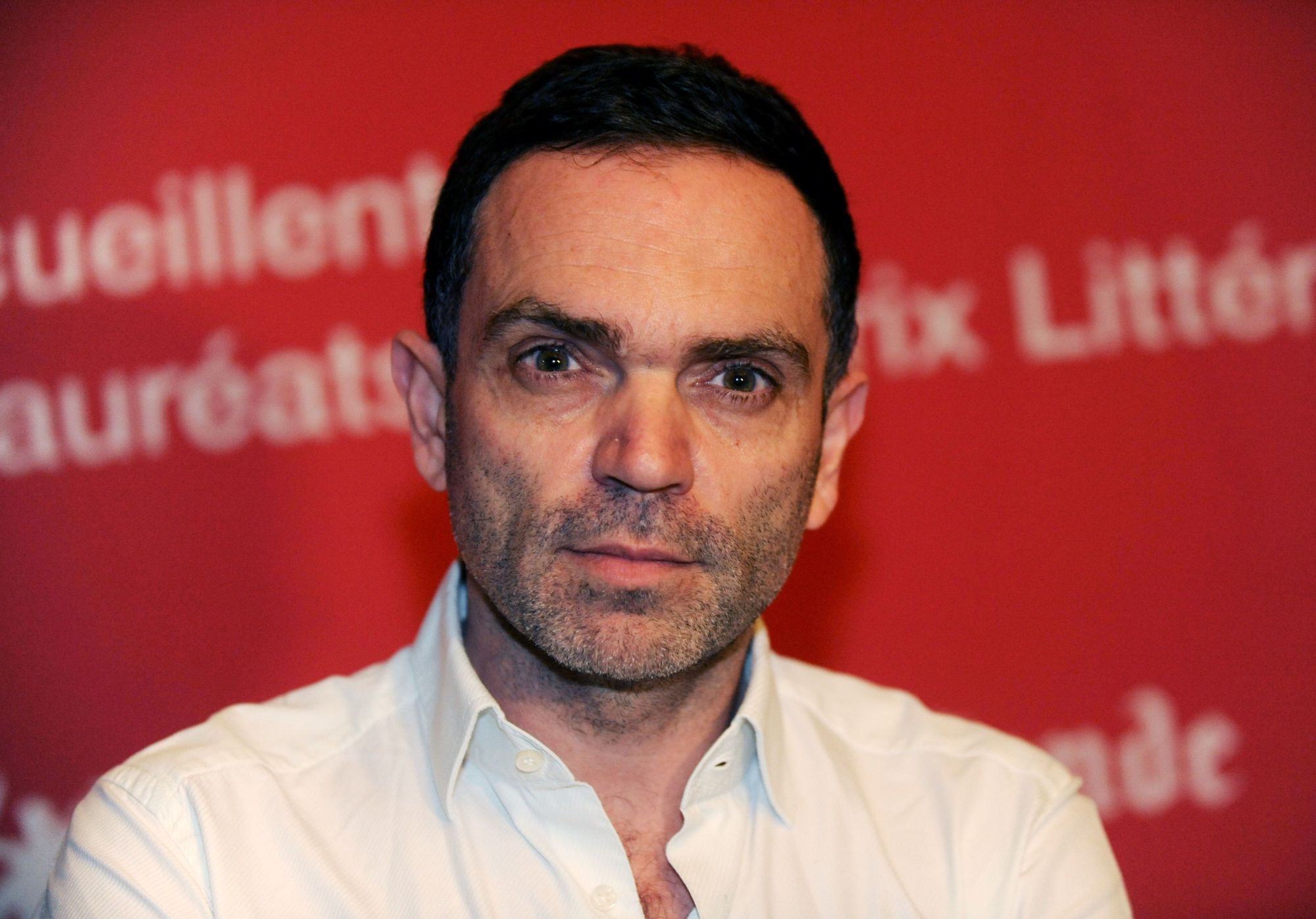 French writer Yann Moix, who won the Renaudot prize, poses on at the Westminster hostel in Le Touquet, northern France, as part of the Touquet's book fair in 2013. Moix defended himself on RTL on Monday after provoking a social media storm by stating in Marie-Claire that he would be 'incapable' of loving a woman aged 50 and above.' | AFP-JIJI