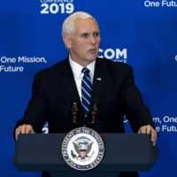 Vice President Mike Pence speaks during the Global Chiefs of Mission Conference \"One Team, One Mission, One Future\" at Department of State on Wednesday in Washington. Pence is claiming that the Islamic State \"caliphate has crumbled\" and the militant network \"has been defeated.\" But his comments came shortly after the U.S. military said American service members were among those killed during an explosion during a routine patrol in Syria. | AP