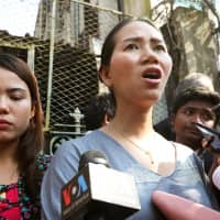 Pan Ei Mon (left) and Chit Su Win, wives of jailed Reuters reporters Wa Lone and Kyaw Soe Oo, speak to the media after the journalists\' appeal was rejected in Yangon, Myanmar, on Friday. | REUTERS