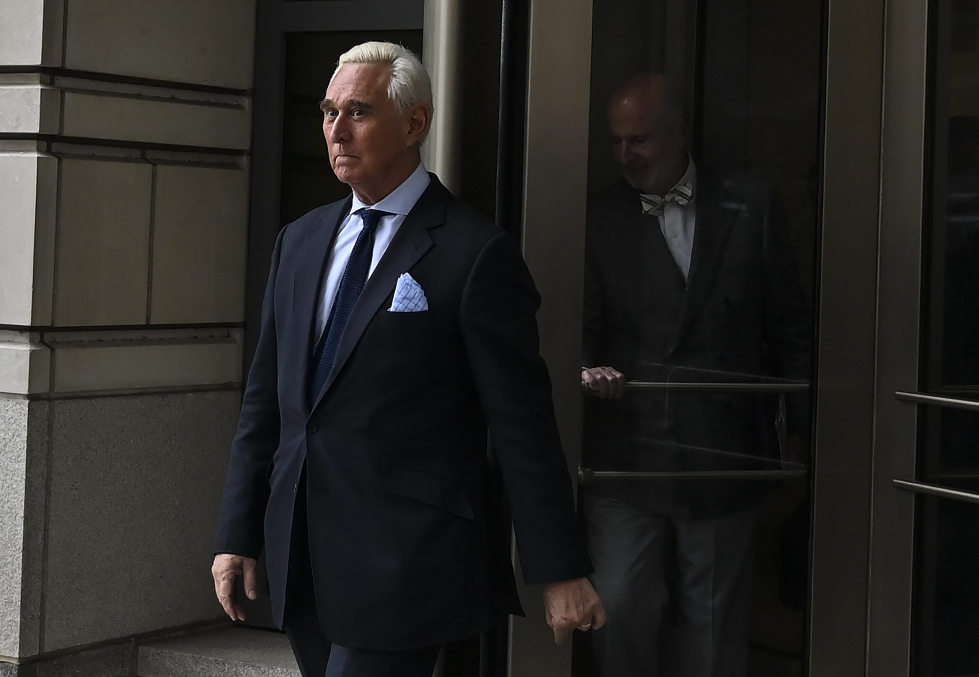 Roger Stone leaves after his arraignment, as part of the Robert Mueller probe, at the U.S. District courthouse in Washington Tuesday. Longtime Donald Trump advisor Stone pleaded not guilty on Tuesday to charges stemming from the ongoing investigation into whether the president's campaign colluded with Russia in the 2016 election. Stone, 66, is charged with lying to Congress, witness tampering and obstruction in relation to his contacts with WikiLeaks, whose publication of embarrassing Russian-hacked communications from Democrat Hillary Clinton's campaign gave a boost to Trump. | AFP-JIJI