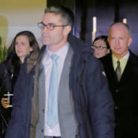 Deputy U.S. Trade Representative Jeffrey Gerrish leaves a hotel in Beijing on Monday. | REUTERS