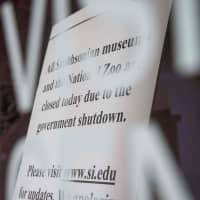 A sign indicates that all Smithsonian museums are closed due to the government shutdown at the Smithsonian Castle in Washington Tuesday. | AFP-JIJI