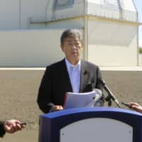 Defense Minister Takeshi Iwaya expresses hope that the second summit between North Korea and the United States will produce concrete results, at a news conference in Hawaii on Friday. | KYODO