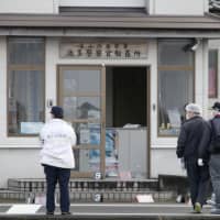 A 22-year-old man was arrested Thursday for attempted murder after he attacked an officer at this police substation in the city of Toyama. | KYODO