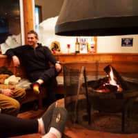 Evening comforts: One of the main attractions of Raicho Lodge is its communal fireplace, perfect for a post-ski hot chocolate. | OSCAR BOYD