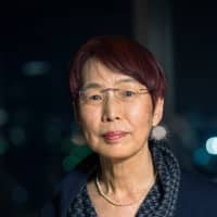 Former University of Tokyo sociology professor Chizuko Ueno poses for a photo in Tokyo in December. | ROBERT GILHOOLY