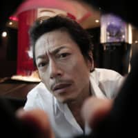 Peeping Tom: The seedy underbelly of a love hotel forms the basis of \"Divine Justice,\" with Hiroshi Mikami taking center stage as a police officer with dubious morals. | &#169; 2018 SOULAGE