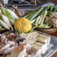 Making hot pot is a group activity: A spread of prepared ingredients for monkfish hot pot, which diners cook themselves at the table. | MAKIKO ITOH