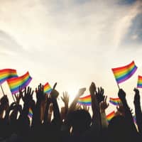 Hands up: A survey recently found that 1 in 11 Japanese identify as sexual minorities. | GETTY IMAGES