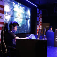 Playing with power: Contestants take part in a trial to become an esports representative for Japan at last year\'s Asian Games. | JESU