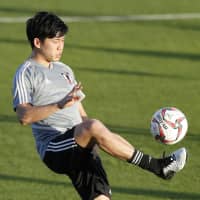 Japan midfielder Wataru Endo practices on Friday in Abu Dhabi. | KYODO