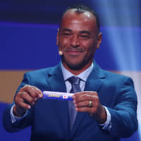 Retired Brazil international Cafu indicates the selection of Japan during the draw event for the 2019 Copa America in Rio de Janeiro. Japan was placed in Group C with Uruguay, Chile, and Ecuador. | REUTERS